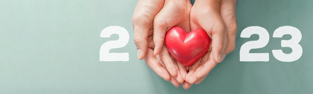 2023 charity - hands holding a heart